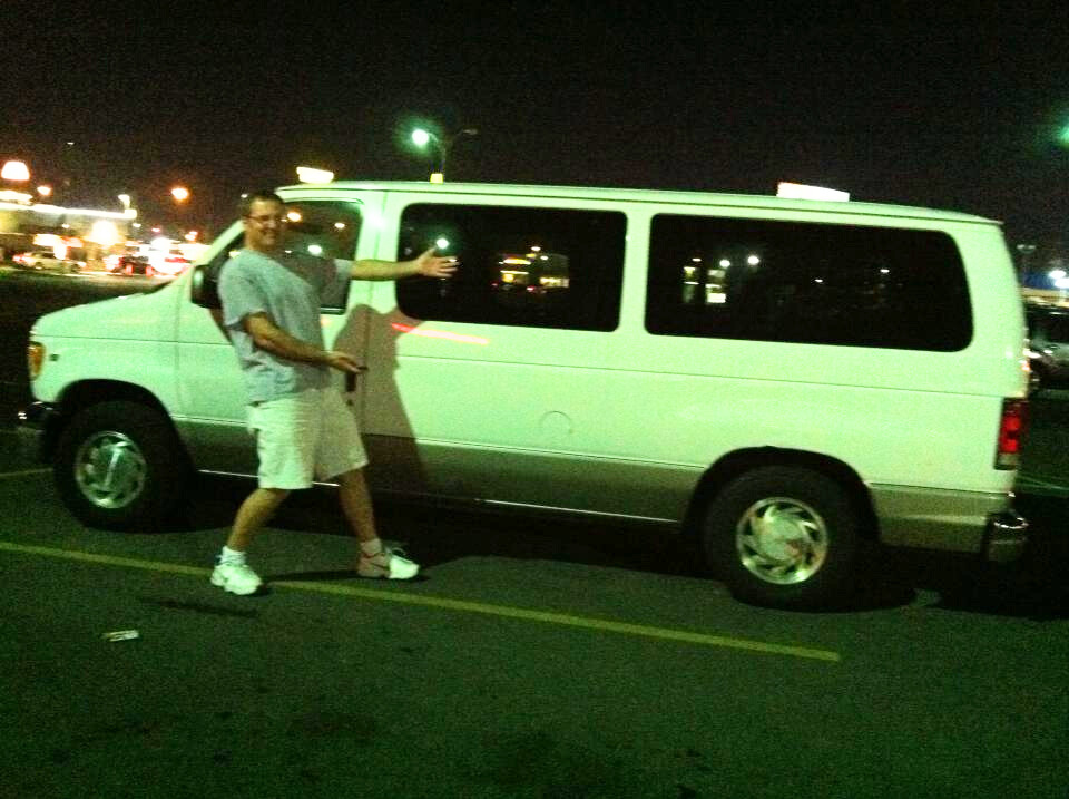 Photo of Mick McCormick with the business van purchased to transport furniture for Georgie Emerson Vintage.