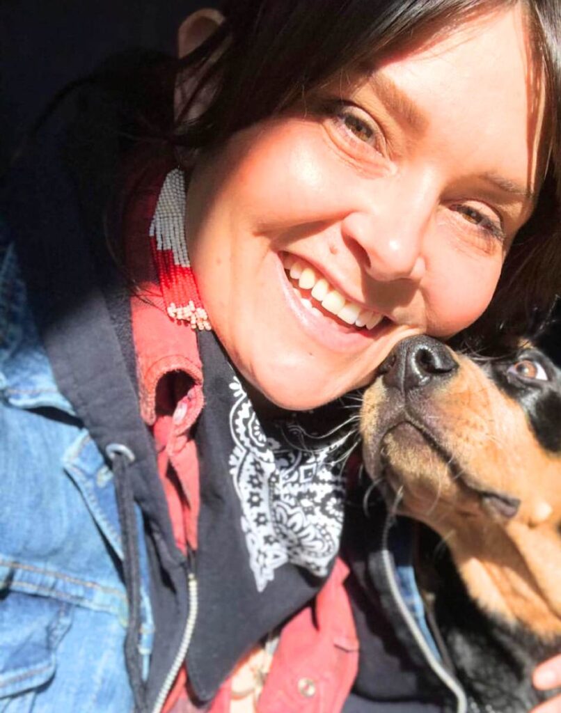 Modern Barber, Stylist ,Nikki Mock, With her BlueTick Coonhound, Honey.